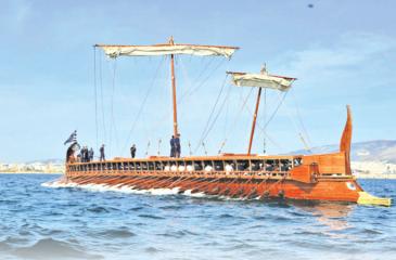 Ancient ship with oars and sails