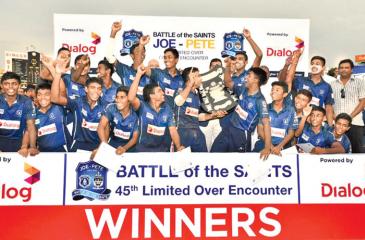 The triumphant cricketers of St. Joseph’s College Johanne de Zilva, Sheran Fonseka, Shevon Daniel, Dineth Jayakody, Dilesh Perera, Dunith Wellalage, Sachintha Ravindu, Lakshan Gamage, Ashen Daniel, Shalinda Seneviratne and Ashan de Alwis celebrate with the Fr. Peter Pillai Shield after beating St. Peter’s College in their Battle of the Saints One-Day match at the SSC ground yesterday   