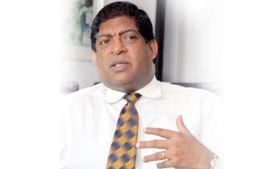  Power,  Energy and Business Development Minister Ravi Karunanayake