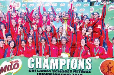 The champions from Holy Family Convent Kurunegala comprising Sethmi Danoshi, Hashini Ishara, Oshadhi Pabasara, Sawani Anupama, Uthpala Sajini, Maheesha Prabashwari, Senudi Maheli, Kithmi Wickramanayake, Sanduni Nidhadhi Rishini Sewwandi, Hiruni Heshani, Manoda Ranasinghe, Taniya Kumari, Nathasha Gethanjali, Senanthi de Silva, Chalani Neesha, Chamodhi Wedagedara, Pavithara Kariyawasm, Binushi, Balasooriya, Nithara Dewmini and Thadisha with the trophy