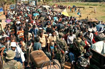 We are finally liberated from the jaws of LTTE terror. ..........  Liberated civilians return to the arms of the Security Forces.