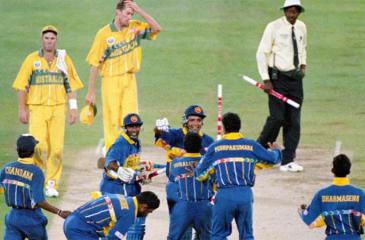 Sri Lanka’s cricketers celebrate winning the World Cup by beating Australia