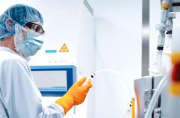 A researcher works in the German BioNTech laboratory in November.