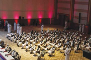 Taliban members attending the intra-Afghan peace
