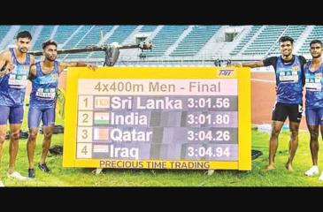 Sri Lanka’s 4x400m men’s relay quartet celebrating their golden run at the Asian Athletics Championship in Bangkok last month. From left: Rajitha Rajakaruna, Kalinga Kumarage, Aruna Dharshana and Pabasara Niku