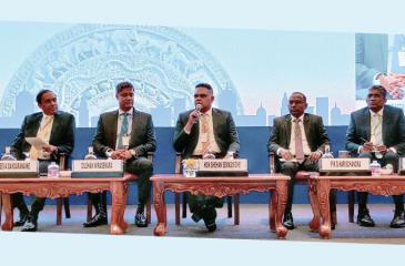The panel discussion in progress in Chennai with State Minister of Finance Shehan Semasinghe. 