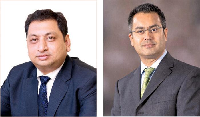 Pankaj Banerjee, Incoming CEO of AIA Insurance AND Shah Rouf, outgoing CEO of AIA Insurance