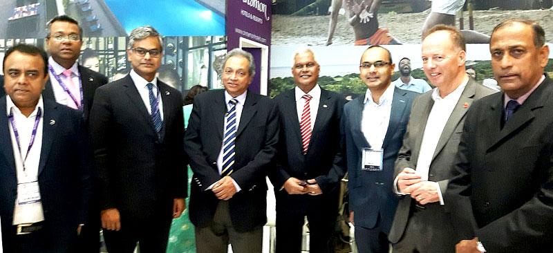 Cinnamon team - Sunimal Senanayake, Rohan Karr, Krishan Balendran with Paddy Withane at the Cinnamon stall- WTM, London 2
