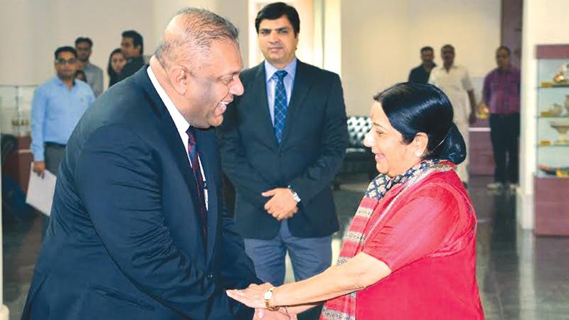 Indian Foreign Minister Sushma Swaraj welcomes her Sri Lankan counterpart Mangala Samaraweera in New Delhi last week  