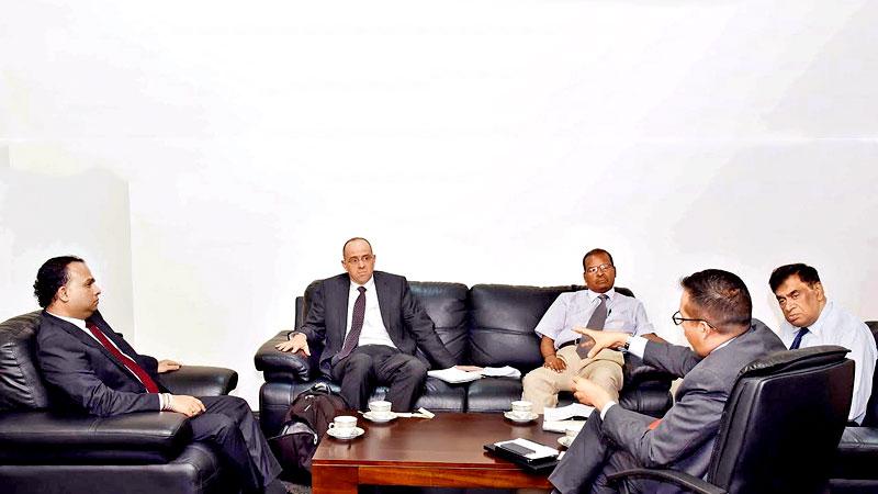 Minister Navin Dissanayake with World Bank officials Ulrich Shmitt, Seenithambi Manoharan, Emannuel Salinas and Agricultural Consultant Jeevaka Atapattu at the meeting.     