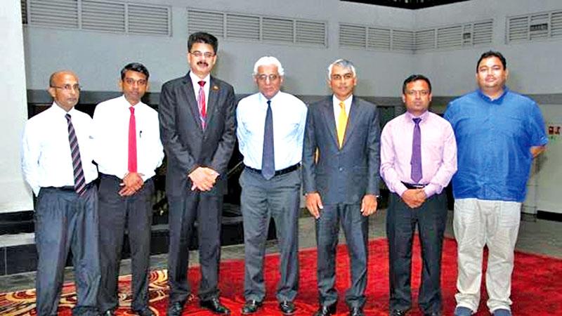 Council Members of the Sri Lanka Ceramics and Glass Council   Standing: From left - Rohan Casiechetty (Ceylon Chamber of Commerce); Wasaba Jayasekera, Sanjay Tiwari, President Elect; Central Bank Governor Dr. Indrajith Coomaraswamy; Outgoing President Mahendra Jayasekera; Wipul Kularathne and Anura Warnakulasooriya.     