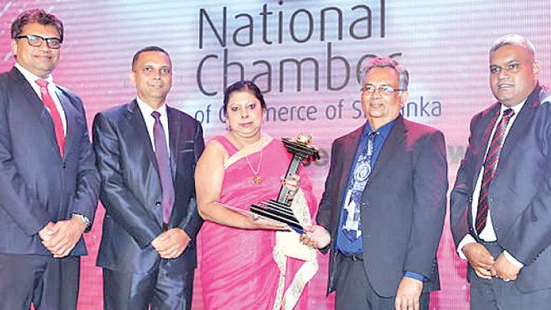 From Left: Nemantha Abeysinghe- GM -Sales and Marketing, Thusitha Premarathna, GM - Finance and Administration , Prof. Eisha Hewabowala, Directress, Nippon Paint Lanka (Pvt) Ltd, Representative of NBEA and Damindra de Silva, AGM - IT and Engineering all of Nippon Paint Lanka