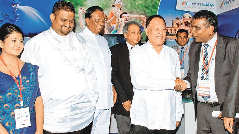 From left: Deputy Minister of Tourism Development and Christian Religious Affairs, Arundika Fernando, Minister of Special Assignments, Sarath Amunugama, Minister of Tourism Development and Christian Religious Affairs, John Amaratunga and President, Sri Lanka Association of Inbound Tour Operators, Devindre Senaratne at the launch of Sancharaka Udawa.