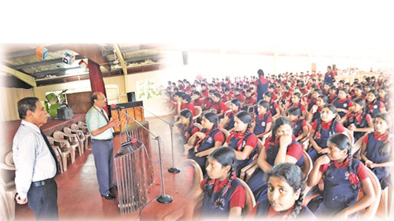 Principal Dr. Noel Vimalendran addresses schoolchildren