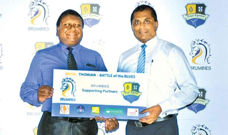 Executive Director of George Steuart Health, Eran Ranasinghe presents the sponsorship package to President of Brumbies - 2017, Surath Silva in support of the Brumbies enclosure.     