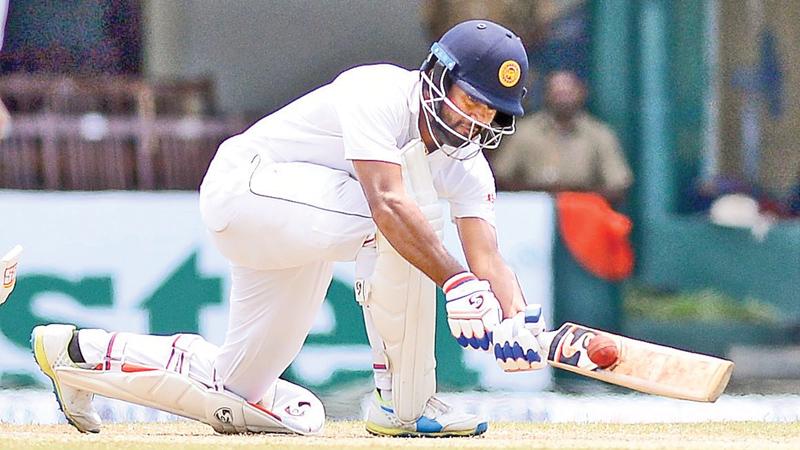 Dimuth Karunaratne gets runs on the leg side during his innings of 126.Pix by Saman Mendis 