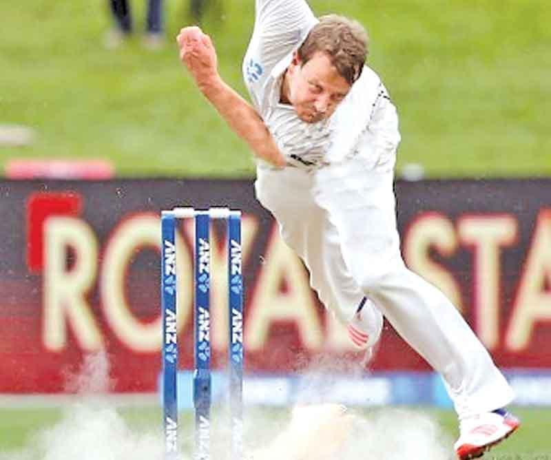 Kiwi paceman Neil Wagner in action in the rain hit first day of the forth test