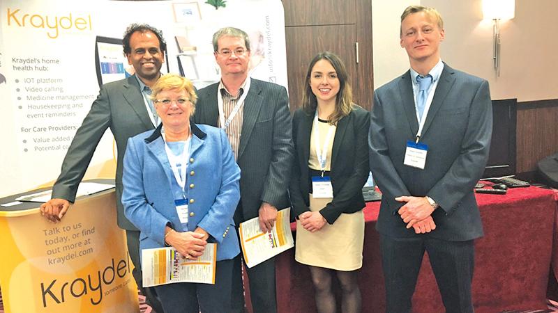 CEO at Mitra Innovation, Dr. Ashok Suppiah and COO, Derek Bell with some of the Kraydel team at DigiHealth UK.