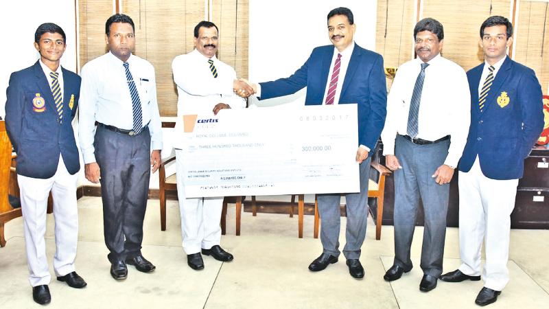 A Certis official presents the sponsorship to check to Royal College principal 