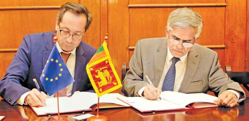Secretary to the Ministry of Finance, Dr. R. H. S. Samaratunge and Ambassador to Sri Lanka and the Maldives for the Delegation of the  European Union, Tung Lai Margue sign the agreement.  