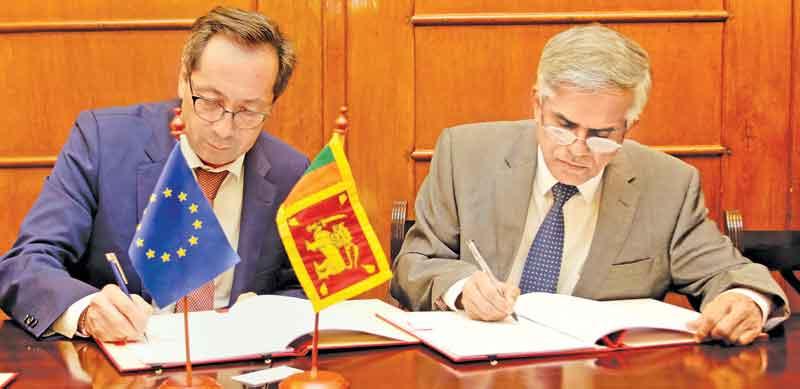 Secretary to the Ministry of Finance, Dr. R. H. S. Samaratunge and Ambassador to Sri Lanka and the Maldives for the Delegation of the European Union, Tung Lai Margue sign the agreement.