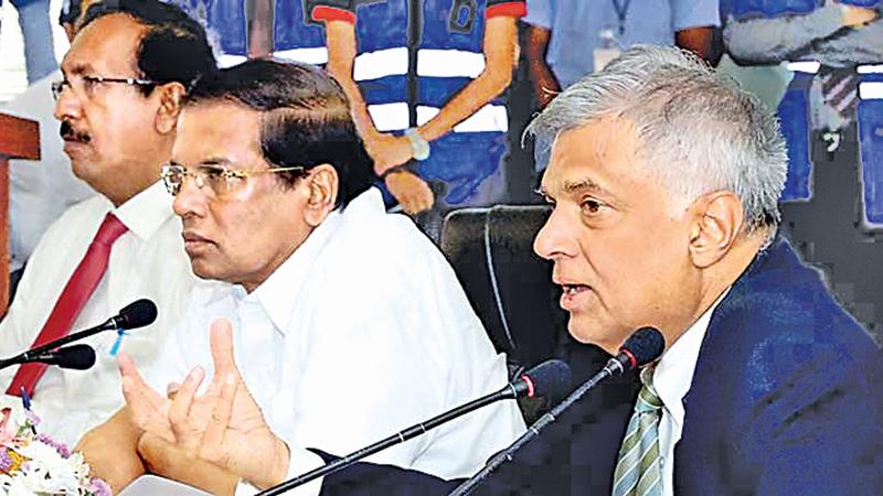 President Maithripala Sirisena and Prime Minister Ranil Wickremesinghe at a high level meeting to discuss on Meetotamulla issue in  Colombo last week.