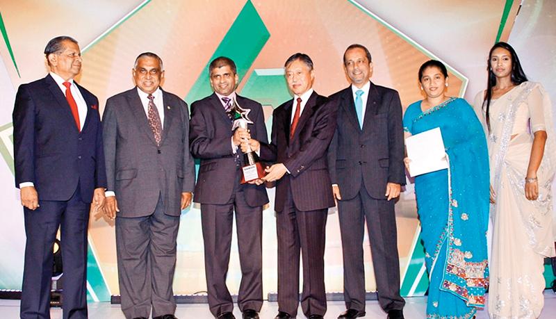 Sanjeewa Bandaranayake and PLC officials receive the Ian Dias Abeysinghe JASTECA CSR/Sustainability Silver Award - 2016.