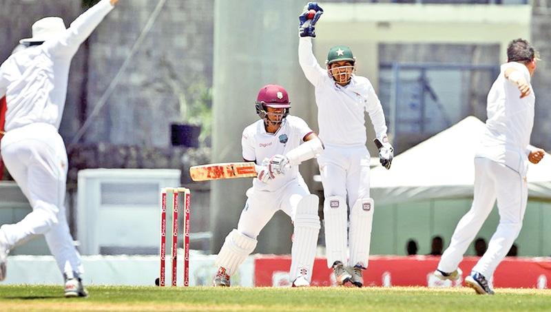 Pakistan wicket keeper Sarfraz Ahmed successfully appeals against Kraigg Brathwaite. - Dawn