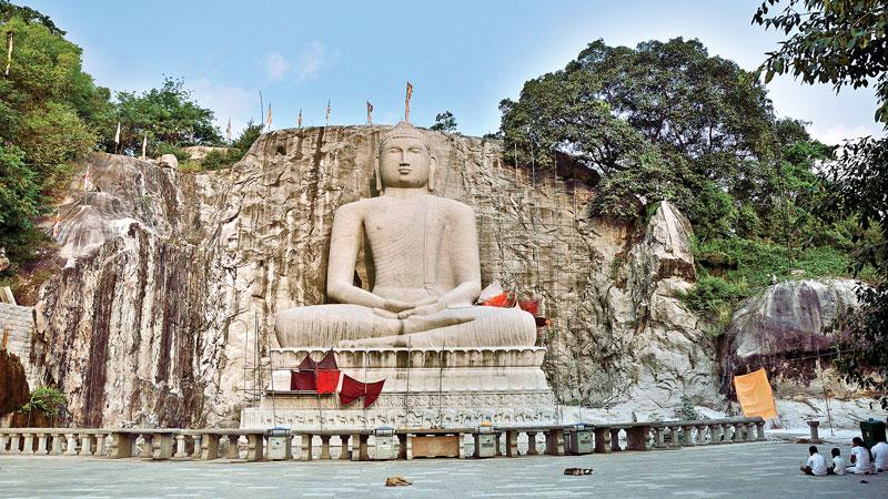 The towering rock-cut Samadhi Buddha statue at Rambadagalla   