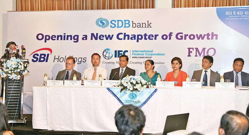 The head table at the press briefing. From left: Arno de Vette (Executive Vice President, SBI Holdings), Alwin B. Kool (Senior Investment Officer – Private Equity, FMO), Nimal C. Hapuarachchi (General Manager/CEO – SDB bank), Mrs Samadanie Kiriwandeniya (Chairperson – SDB bank), Ms Amena Arif (Country Manager – Sri Lanka & Maldives, IFC), Lakshman Abeysekara (Senior Director – SDB bank), Terrance Kumara (Head of Finance – SDB bank).