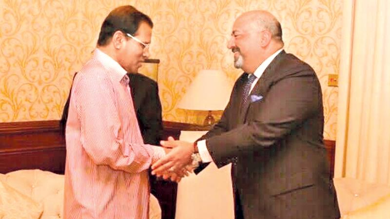 U.S. Ambassador to Sri Lanka Atul Keshap greets President Maithripala Sirisena