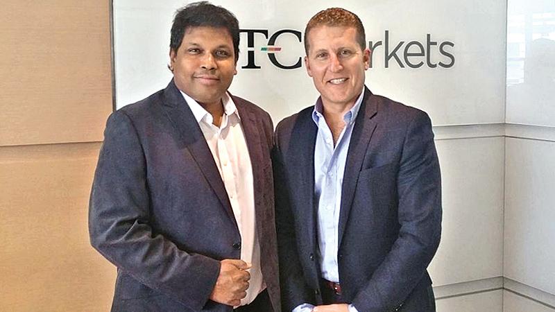 Duo World Inc. Founder and CEO Muhunthan Canagasooryam (left) with OTC Markets, Executive Vice President Jason Paltrowoitz.  