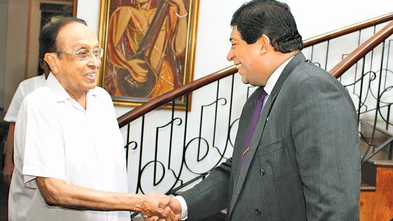 Foreign Minister Ravi Karunanayake with former Finance Minister Ronnie de Mel