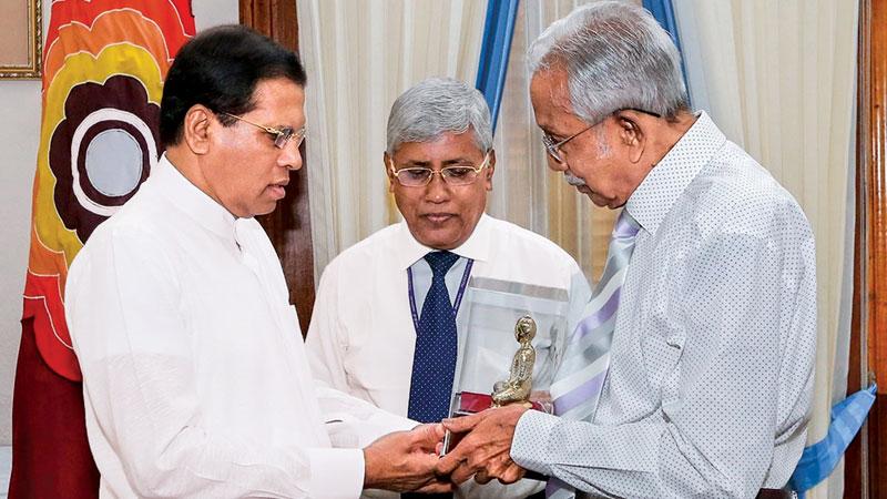 A brass replica of the Buddha Statue presented to President Maithripala Sirisena