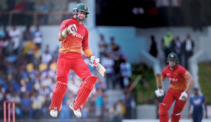 Zimbabwe’s cricketer Craig Ervine celebrates after victory in the fourth one-day international (ODI) cricket match between Sri Lanka and Zimbabwe at the Suriyawewa Mahinda Rajapakse International Cricket Stadium - AFP    