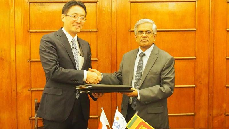 The agreement was signed by Secretary, Ministry of Finance and Mass Media, Dr. R. H. S.  Samaratunga and Chief Representative,  JICA Sri Lanka Office, Fusato  Tanaka.