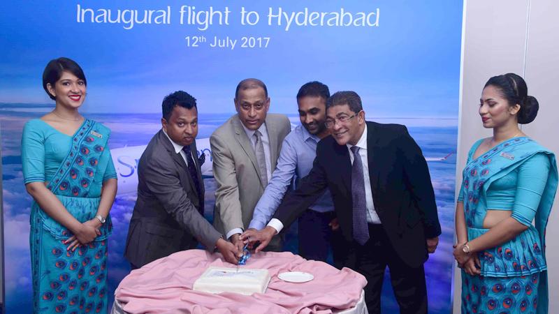 SriLankan Airlines, Director Harendra K. Balapatabendi with Chief Commercial Officer, Siva Ramachandran, Brand ambassador of SriLankan and former Sri Lanka cricket captain Mahela Jayewardene and SriLankan Airlines, Consultant Lal Perera cutting a cake minutes before the inaugural flight to Hyderabad.   