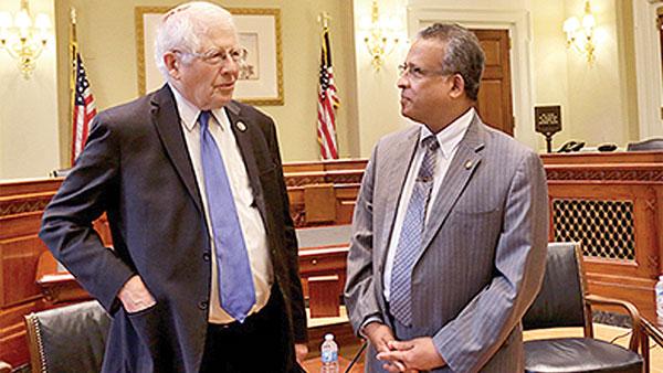 Sri Lanka Ambassador in the USA, Prasad Kariyawasam in conversation with a US statesman.