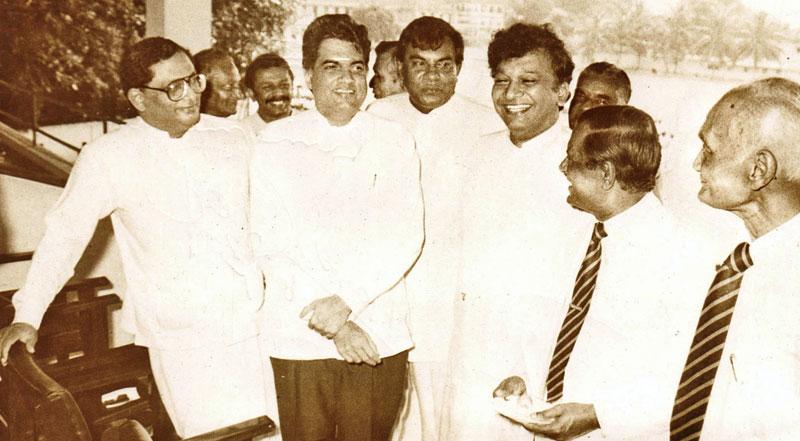 in a humourous mood: Ranil with Tyronne Fernando, Dinesh Gunawardena (Just behind Ranil on his right),  C.V. Gooneratne and Lakshman Kiriella 