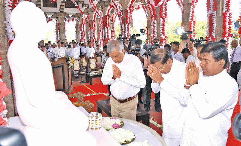 President Maithripala Sirisena, Prime Minister Ranil Wickremesinghe and Minister of Justice and Buddhasasana, Wijeyadasa Rajapakshe take part at the religious ceremony to mark the presentation of ‘Aktha Pathra’ to Agga Maha Panditha Most Ven. Kotugoda Dhammawasa Mahanayake Thera to commemorate the prelate’s appointment as the Mahanayake Thera of the Sri Lanka Amarapura Maha Nikaya. The event took place at the Independence Square, Colombo last week. (Pic: Malan Karunaratne) 