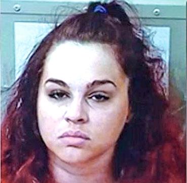Police said Kate Prichard pulled the pistol out of her wedding dress and aimed it at her husband 
