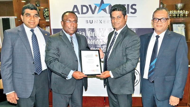 Business Manager, SGS Lanka, Chamika Wimalasiri (third from left) presents the OHSAS certificate to Director, Advantis Bunkering, Praneeth Gunawardena (second from left). Managing Director, Hayleys Advantis Ruwan Waidyaratne (extreme left) and Group Director, Hayleys Advantis, Shano Sabar (extreme right) look on.     