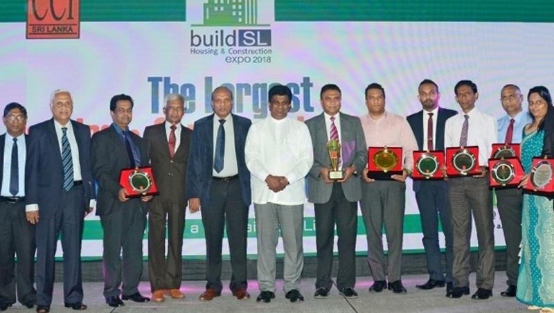 The sponsors with their tokens of appreciation with  Deputy Minister Ajith  P. Perera.
