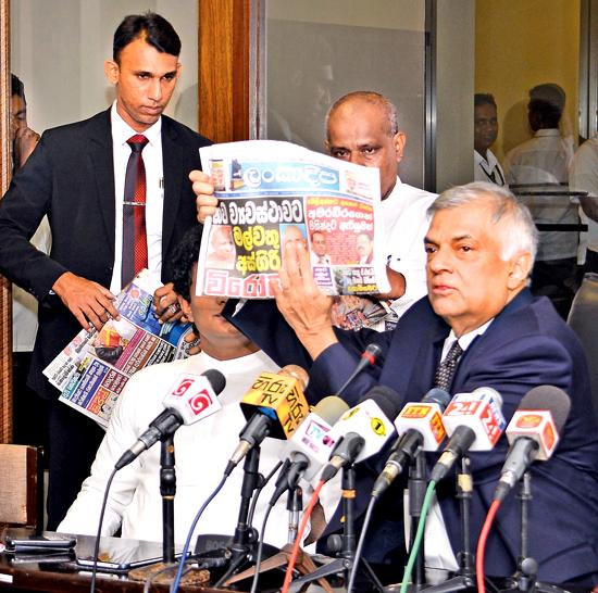 Prime Minister Ranil Wickremesinghe challenged the newspaper editors who had carried misleading reports 