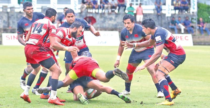 Pic: Malan Karunaratne An exciting moment in yesterday’s  opening game of  the Dialog Inter Club Rugby League match  between Kandy SC and CH&FC played  at  the Race Course grounds.