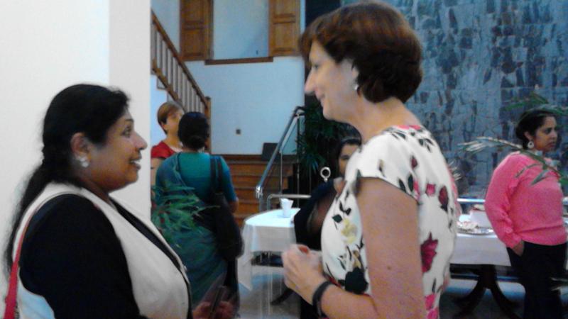 Dutch Ambassador in Colombo Joanne Doornewaard  talks to a woman candidate