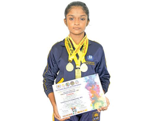 Tharushi outstands in Karate! | Sunday Observer