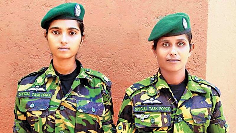 Sub Inspector R.A.D. Kanchana and Constable Nirmala Kumudini Senanayake