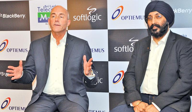 Senior Vice President, General Manager Mobility Solutions at BlackBerry Alex Thurber (on left) and Optiemus Infracom Executive Director Hardip  Singh brief journalists at the launch. Pic: Thushara Fernando 