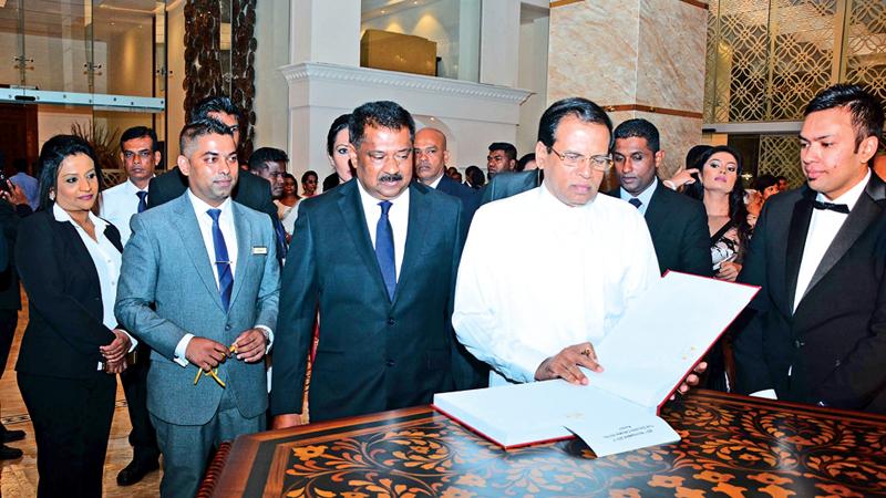 President Maithripala Sirisena together with the Chairman of Golden Crown Hotel Shryananda Wijekoon, Managing Director Chanuka Wijekoon, Director Finance Hansani Wijekoon inaugurate the newly opened super luxury hotel Golden Crown in Ampitiya, Kandy.  Pix: Sudath Malaweera